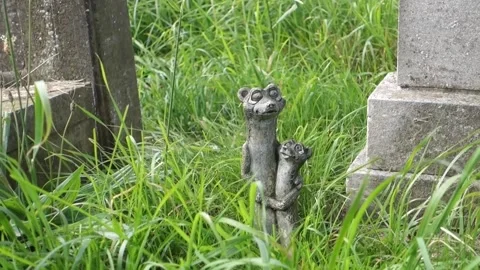 Moving words on a graveyard headstone with a small statue. Stock Footage 138526977