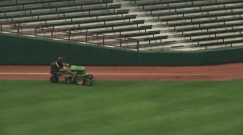 Mowing the baseball diamond Stock Footage 56947498