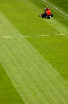 Mowing grass Stock Photos