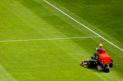 Mowing grass Stock Photos