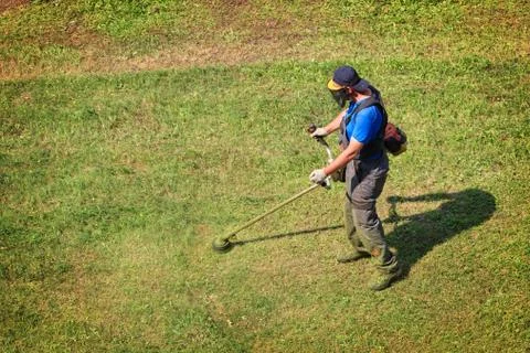 Mowing the grass Stock Photos