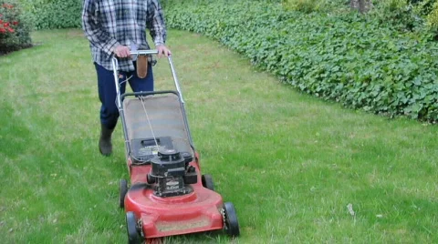Mowing the lawn in corner Stock Footage 688629