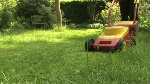 Mowing the lawn Stock Footage 736351