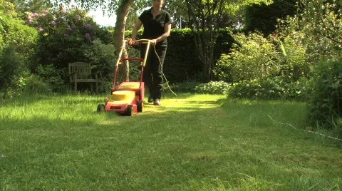 Mowing the lawn Stock Footage 736390