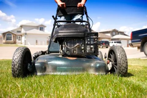 Mowing the lawn Stock Photos