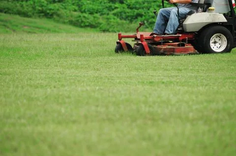 Mowing the lawn Stock Photos