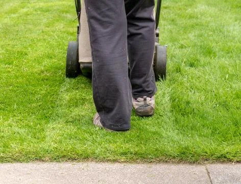 Mowing the lawn Stock Photos