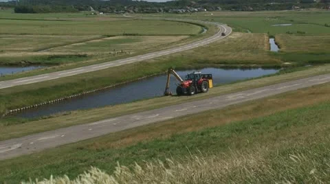 Mowing roadside - high angle Stock Footage 20328780
