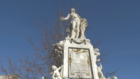 Mozart statue in Josefsplatz against blue sky in winter, Vienna, Austria, Europe Stock Footage