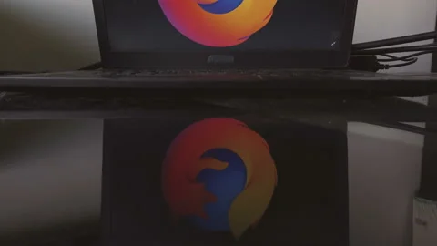 Mozilla Firefox icon laptop computer screen tilting Stock Footage 132268272