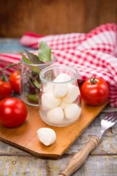 Mozzarella and basilicas Stock Photos