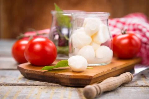 Mozzarella and basilicas Stock Photos