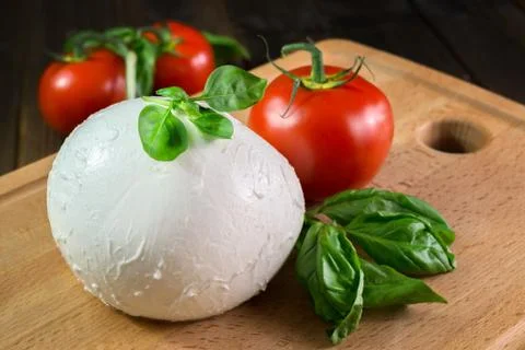 Mozzarella and tomatoes Stock Photos