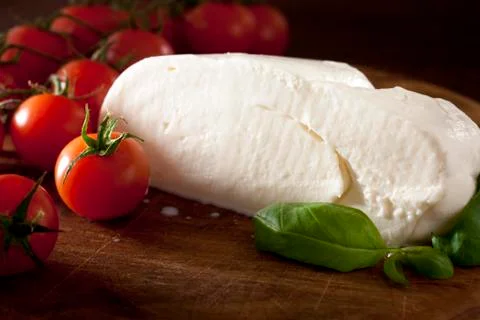 Mozzarella with Basil and Tomatoes Stock Photos