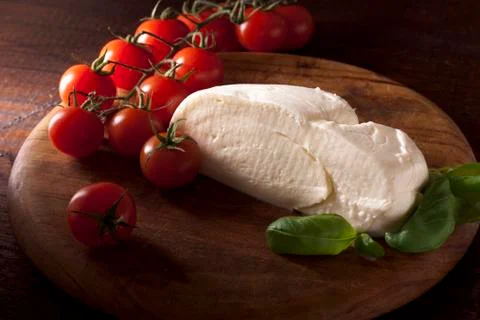 Mozzarella with Basil and Tomatoes Stock Photos