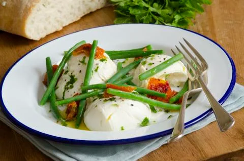Mozzarella with beans Stock Photos