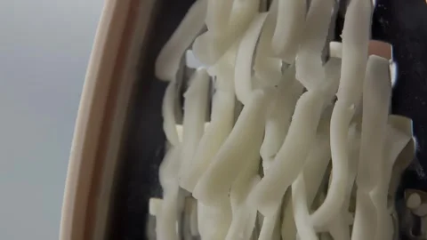 Mozzarella being grated Video stock 303424094