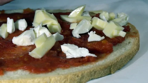 Mozzarella on Bread with Tomato Stock Footage 129310555