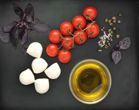 Mozzarella cheese, cherry tomatoes, Basil Stock Photos