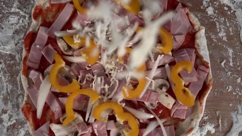 Mozzarella cheese falling on pizza Stock Footage 131046042
