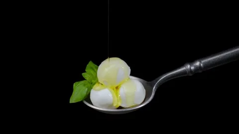 Mozzarella cheese with green basil and olive oil. Stock Footage 157736863