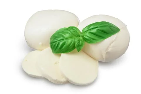 Mozzarella cheese sliced with basil leaf isolated on white background with Stock Photos