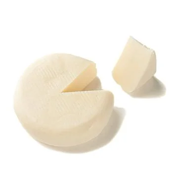 Mozzarella cheese without packaging. A piece of triangular shape has been cut Stock Photos