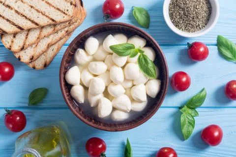 Mozzarella , cherry tomatoes and bread Stock Photos