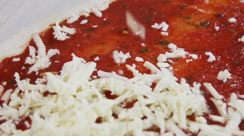 Mozzarella falls on pizza dough, grated cheese in SLOW MOTION Stock Footage