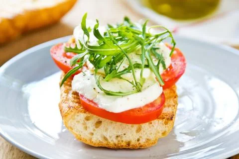 Mozzarella with rocket sandwich Stock Photos