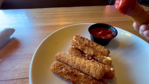 Mozzarella Stick Appetizer in Restaurant Stock Footage 319540416