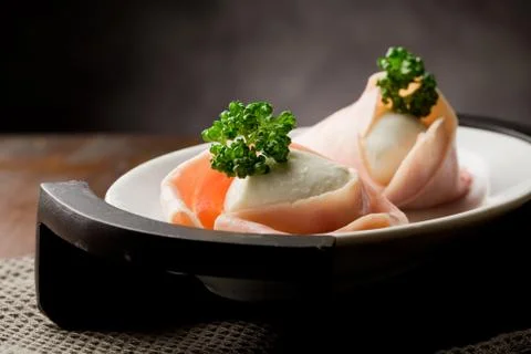 Mozzarella with wrapped ham Stock Photos