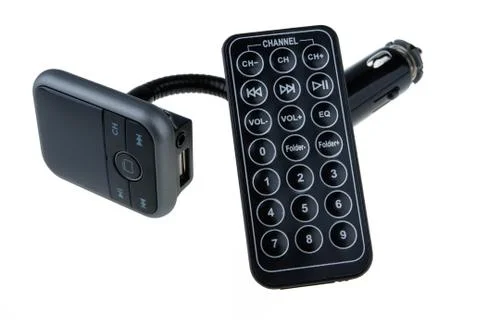Mp3 Fm transmitter with remote control isolated on white background. It plays Photos