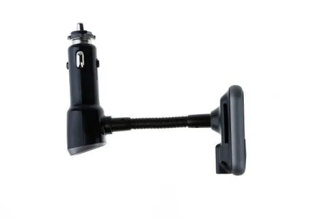 Mp3 Fm transmitter with remote control isolated on white background. It plays 库存照片