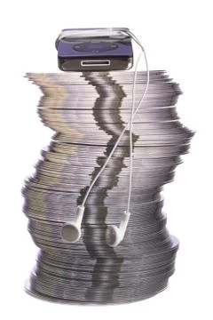 MP3 Player placed on top stack of CDs 스톡 사진