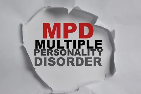 MPD - Multiple Personality Disorder Text written in torn paper 写真素材