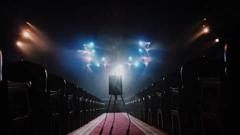 Mpty Easel On Stage Under Dramatic Spotlight In Dark Hall Stock-Footage 336327152