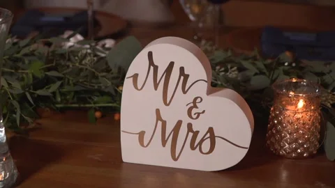 Mr and Mrs Wedding Reception Table Sign 120fps Slow Motion Stock Footage 148499646