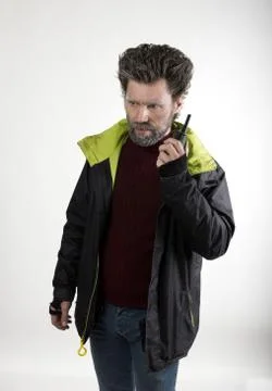 Mr. IceMan aggression, he talking on walkie-talkie. fashion man in knitted 写真素材
