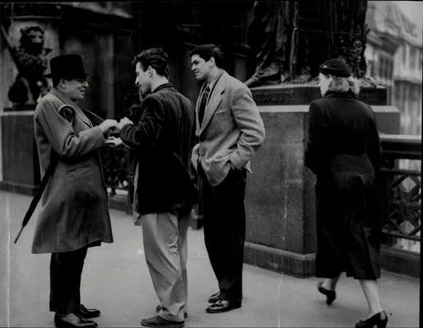 Mr Justice (patrick) Devlin Stops And Smiles And Signs An Autographer For Two Yo Stock Photos
