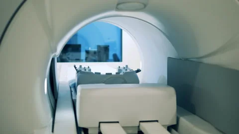 MRI machine with a moving table shown fr... | Stock Video | Pond5