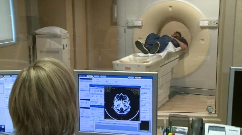 MRI of Man's brain with control room Stock Footage 692354