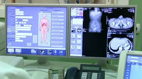 MRI or CT scanner, scan of male patient, tilt-up screen to machine in process Stock Footage 10918370
