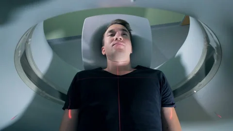 MRI scanning process carried out on a male patient Video stock 97900041