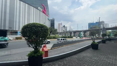 MRT-3 Train, Urban Traffic, Mall and Skyscrapers in Ortigas 4K 60fps Stock Footage 338278687