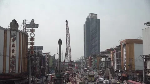 MRT Bangkok metro transit system construction site on a street in Bangkok. Stock Footage 313470909