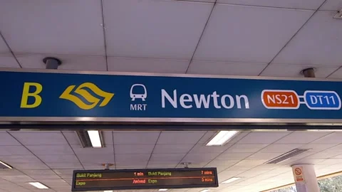 MRT Station Sign. Newton MRT Station In Singapore. low angle, zoom-out Stock Footage 156836986