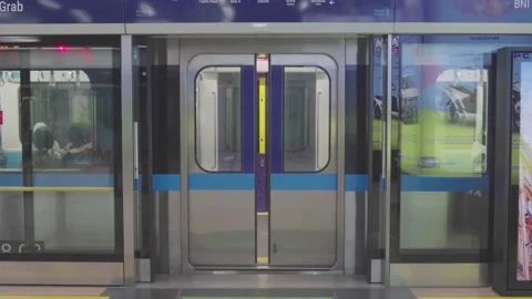 MRT train door closes itself with technology when leaving the station Stock Footage 224257468