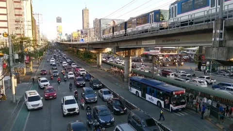 MRT Train Passing the Road of Metro Manila Main Highway Philippines Video stock 237410492
