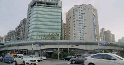 MRT train runs through elevated railway in front of buildings Stock Footage 101953450